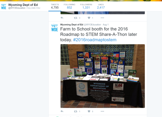 A tweet from the Wyoming Department of Education is displayed that reads, "Farm to School booth for the 2016 Roadmap to STEM Share-A-Thon later today. #2016roadmaptostem" and shows a picture of the booth