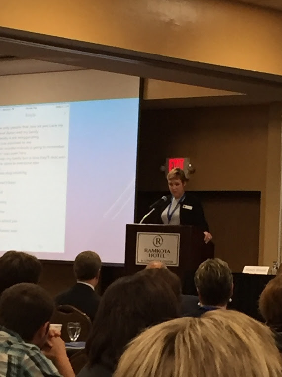 State Auditor Cynthia Cloud speaking at the Governor's Suicide Prevention Symposium.