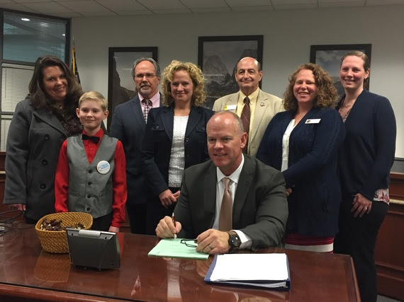 Supporters of SF35 with State Senator Stephan Pappas, WDE staff, State Superintendent Jillian Balow and Governor Matt Mead at the bill signing.