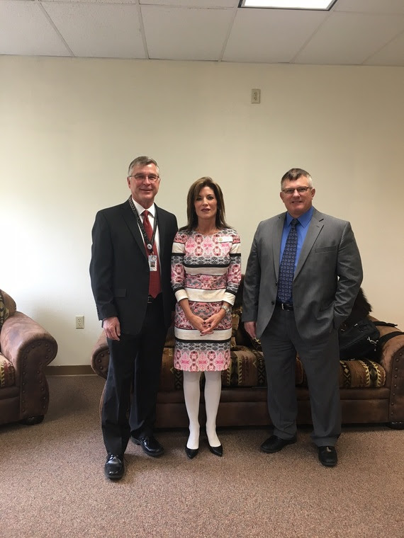 Fremont #25 Superintendent Terry Snyder and Fremont #38 Superintendent Kenneth Crowson stand with WDE Chief Policy Officer Lisa Weigel before the state board meeting in Arapahoe.