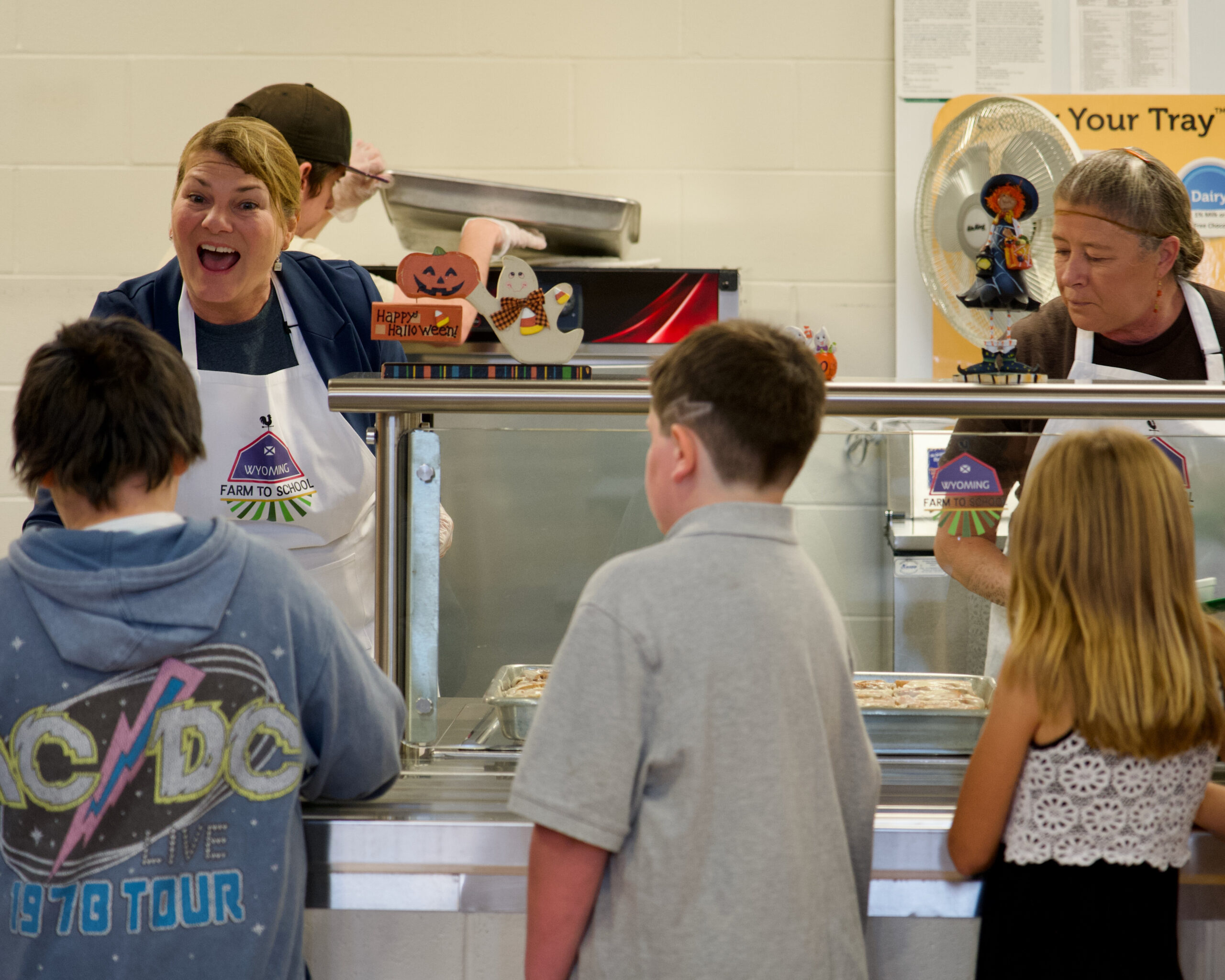 First Lady Jennie Gordon serves students at Douglas Upper Elementary as part of the Wyoming Farm to School Day celebrations.